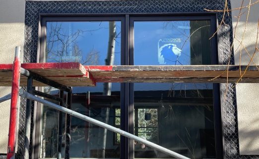 Surgical 43-Window Integration and Total Stucco Resurfacing in Park City, UT