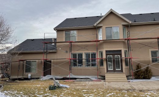 Professional scaffolding and site preparation for a full forensic exterior remodel in North Salt Lake, UT.